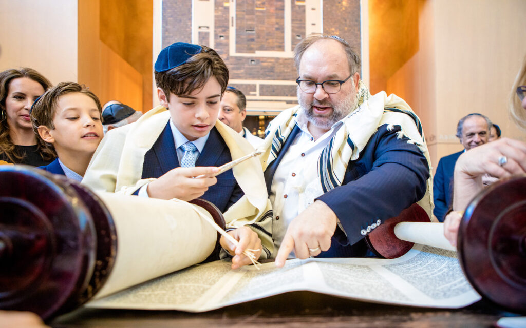 toronto-bar-mitzvah-torah-bceremony Bar mitzvah boy reading from the Torah during his ceremony in Toronto